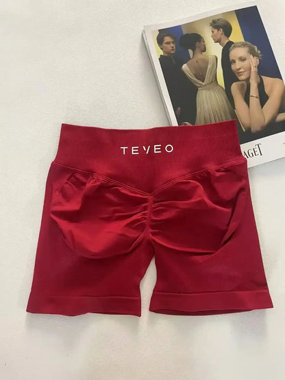 TEVEO Short De Yoga Femme Extensible Respirant Pêche Hanche Hanche Fitness Short de Course Hanche Haute Stretch Mèches De Sueur