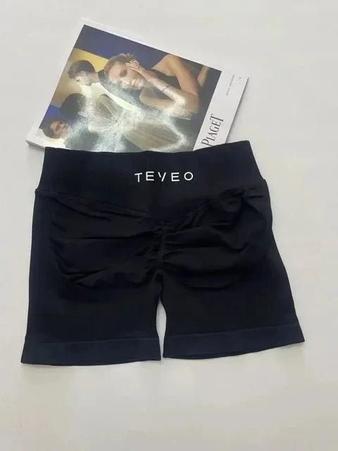 TEVEO Short De Yoga Femme Extensible Respirant Pêche Hanche Hanche Fitness Short de Course Hanche Haute Stretch Mèches De Sueur