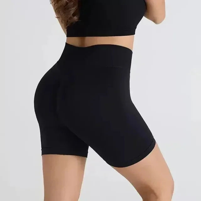 TEVEO Short De Yoga Femme Extensible Respirant Pêche Hanche Hanche Fitness Short de Course Hanche Haute Stretch Mèches De Sueur