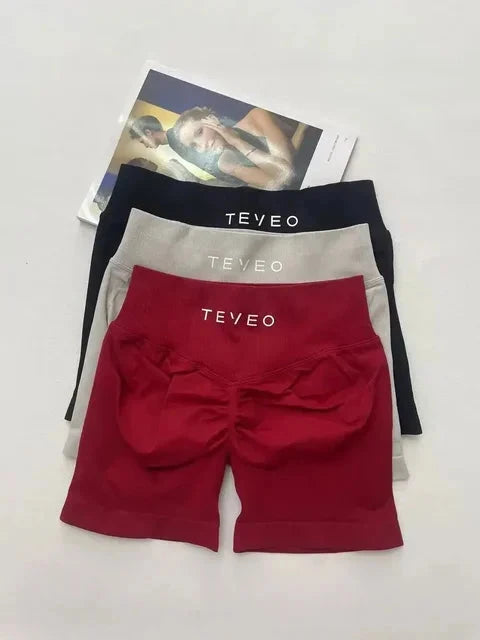 TEVEO Short De Yoga Femme Extensible Respirant Pêche Hanche Hanche Fitness Short de Course Hanche Haute Stretch Mèches De Sueur