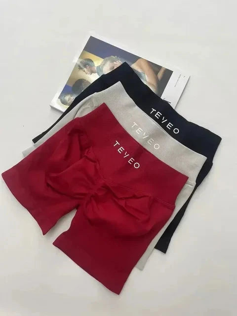 TEVEO Short De Yoga Femme Extensible Respirant Pêche Hanche Hanche Fitness Short de Course Hanche Haute Stretch Mèches De Sueur