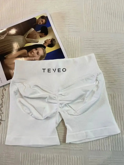 TEVEO Short De Yoga Femme Extensible Respirant Pêche Hanche Hanche Fitness Short de Course Hanche Haute Stretch Mèches De Sueur