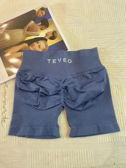 TEVEO Short De Yoga Femme Extensible Respirant Pêche Hanche Hanche Fitness Short de Course Hanche Haute Stretch Mèches De Sueur