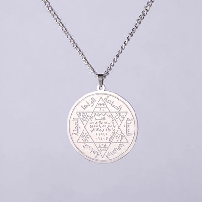 Three Hebrew letters are written on the necklace