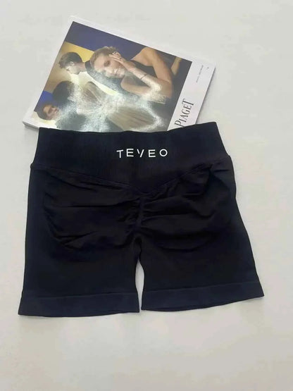 TEVEO Short De Yoga Femme Extensible Respirant Pêche Hanche Hanche Fitness Short de Course Hanche Haute Stretch Mèches De Sueur