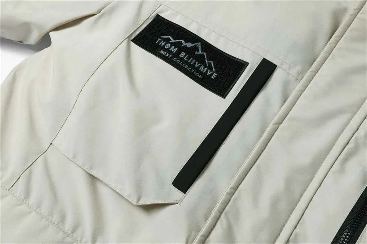 New winter jackets for men with hoods and leather collars. New high-quality waterproof jackets for men. Casual and warm jackets